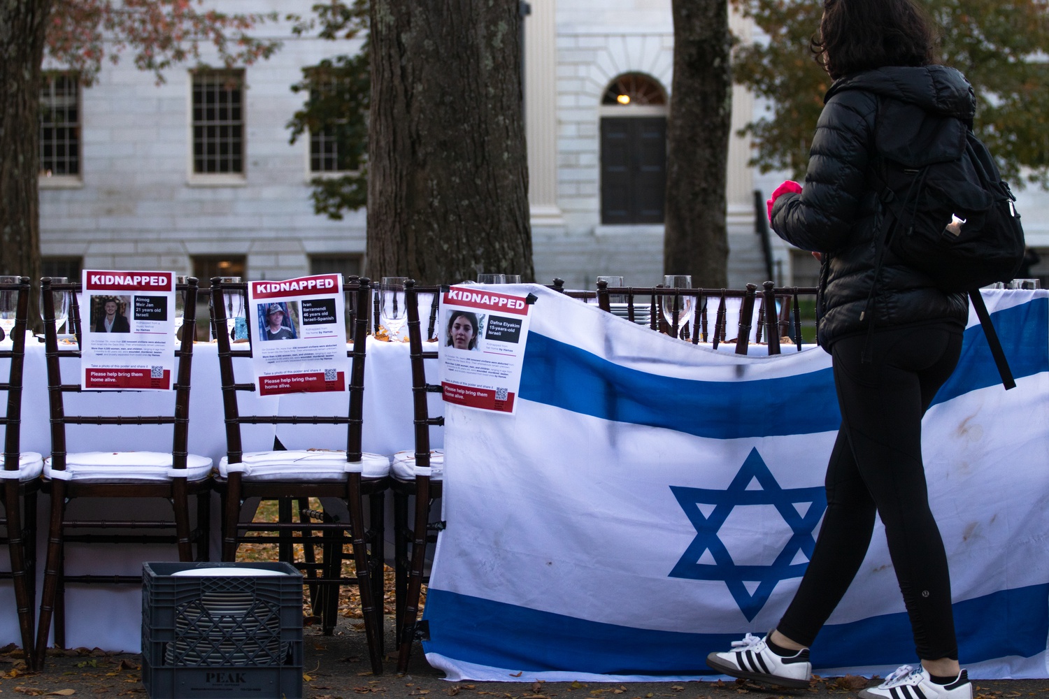 Harvard Chabad helped organize a more than 200-foot Shabbat table installation in the Yard last week to represent the hundreds of hostages held by Hamas.