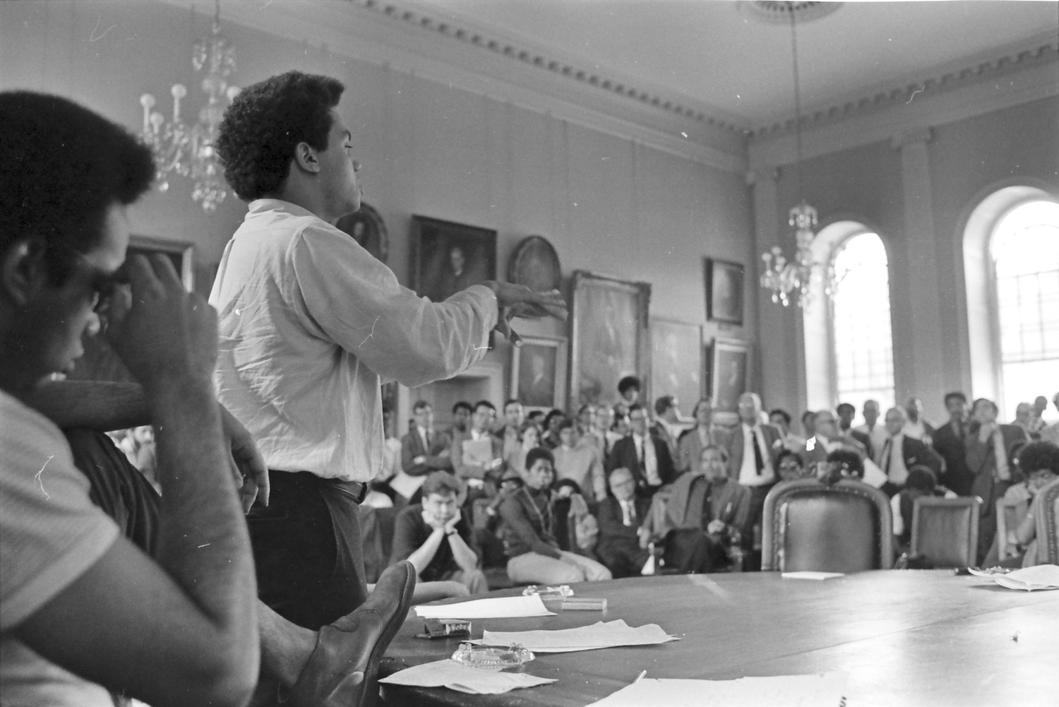 Wesley E. Profit '69, a member of AFRO, speaks at a meeting between AFRO members and Harvard faculty.