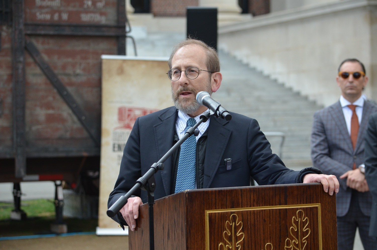 University Provost Alan M. Garber spoke at the opening ceremony of the Hate Ends Now touring exhibit, which aims to combat hatred and educate visitors about the Holocaust.