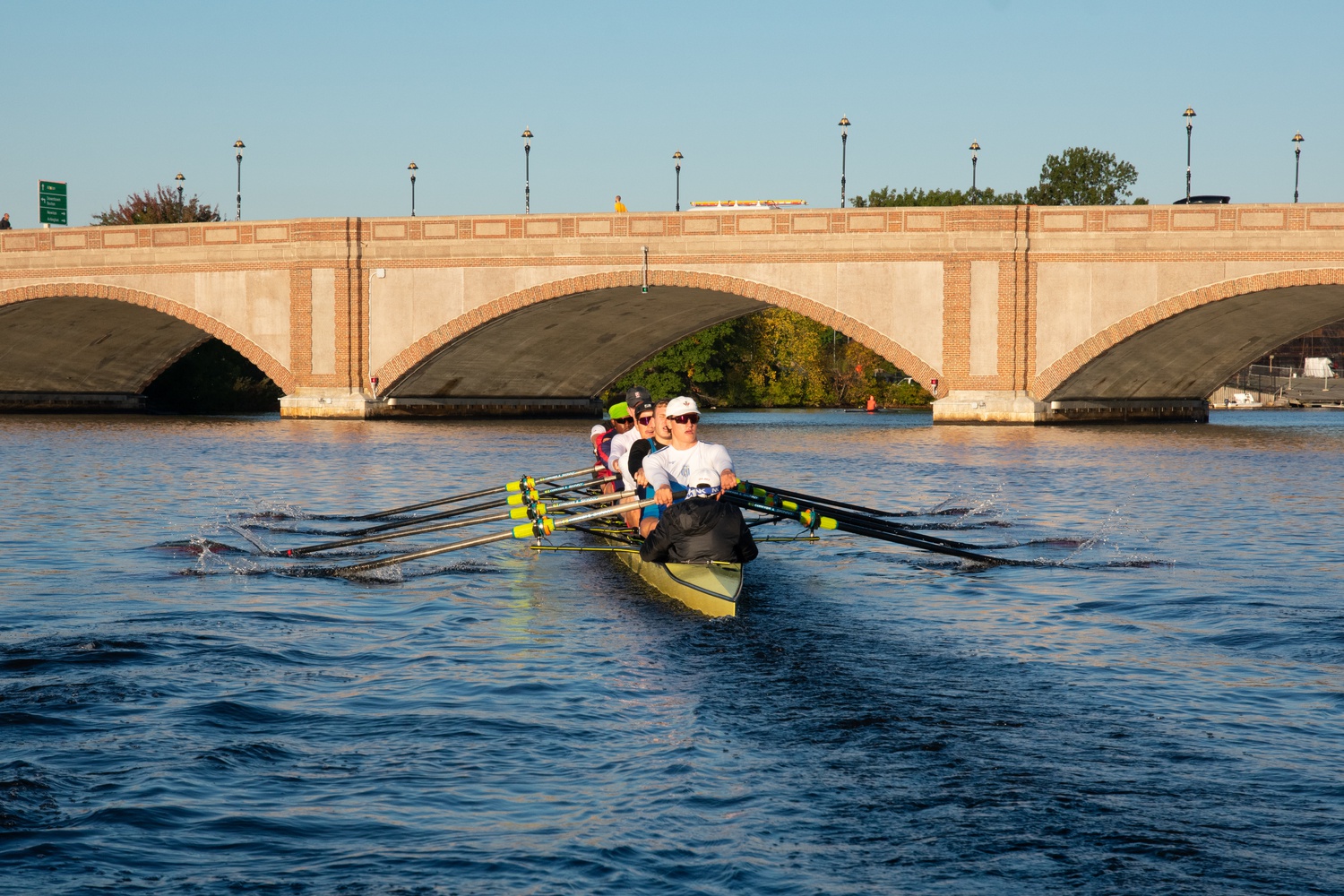 The Harvard men's heavyweight rowing team heads towards the Anderson Memorial Bridge on October 19.