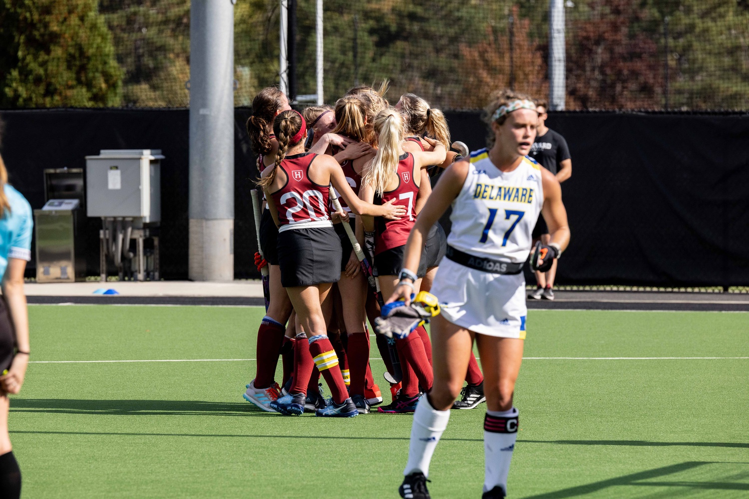 The Harvard field hockey team celebrates a goal on October 16, 2022 at home against Delaware.