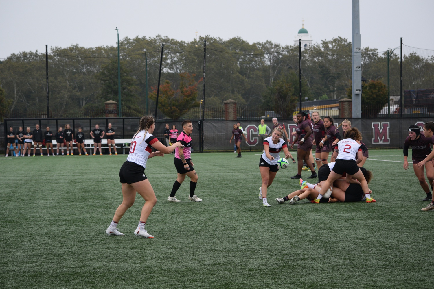 Harvard women's rugby turns the ball upfield at home against Brown on September 30.